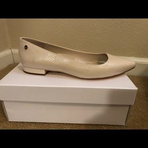 New! Calvin Klein beige patent flats size 7.5